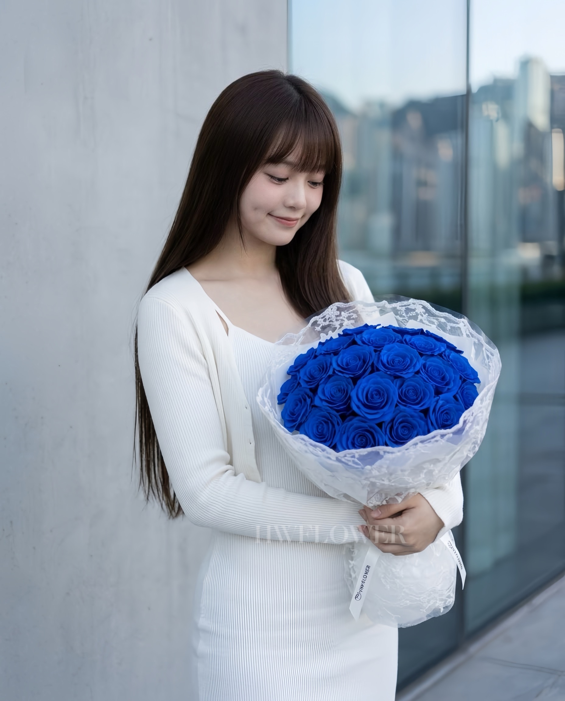 Royal blue soap rose bouquet featuring rich blue roses and delicate lace fabric wrapping.